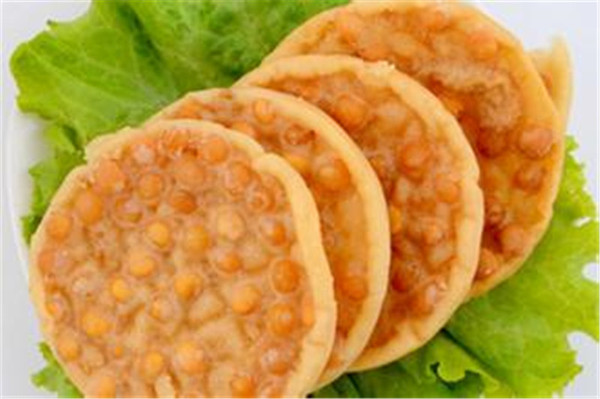 但是最为常见的是花生和黄豆的,我们也俗称花生饼或者黄豆饼 铜勺饼