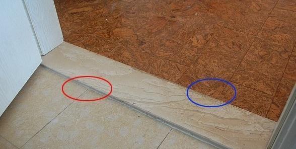 建议过门石比卫生间地面略高5~10毫 ..