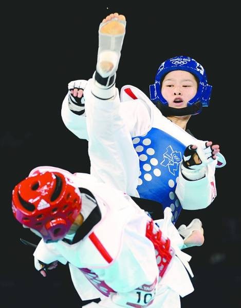 8月8日,在伦敦奥运会跆拳道女子49公斤级比赛中,中国选手吴静钰以8:1