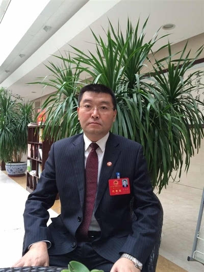 西宁市人大代表,城东区区长李志坚