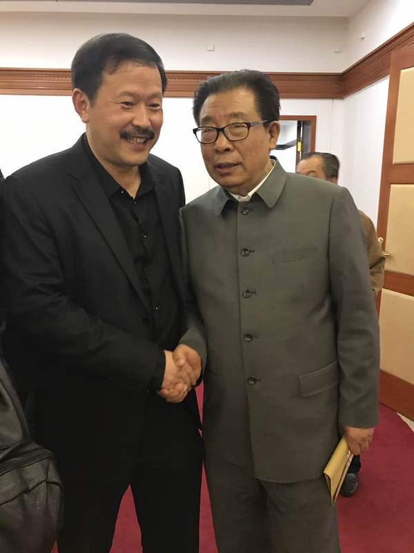 深圳市企业家协会会长刘应力先生与九通金控董事长张滨先生)