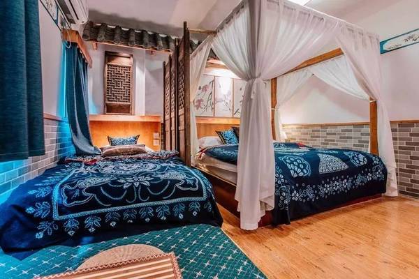 他用26间不同民族的客房,诠释他对云南的爱