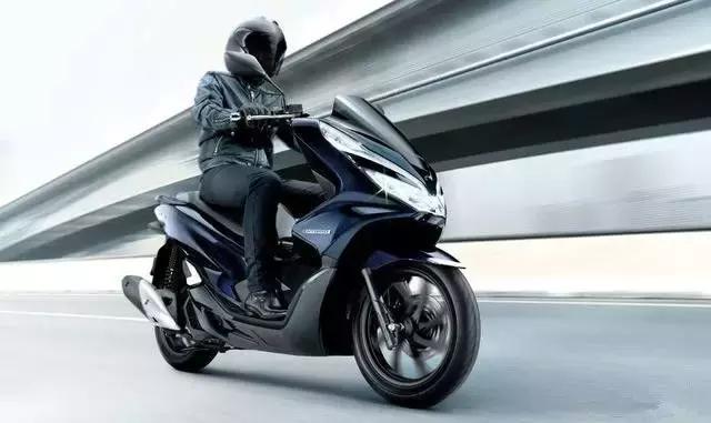 又见本田黑科技全球首款油电混动摩托9月来袭 汽车频道 手机搜狐